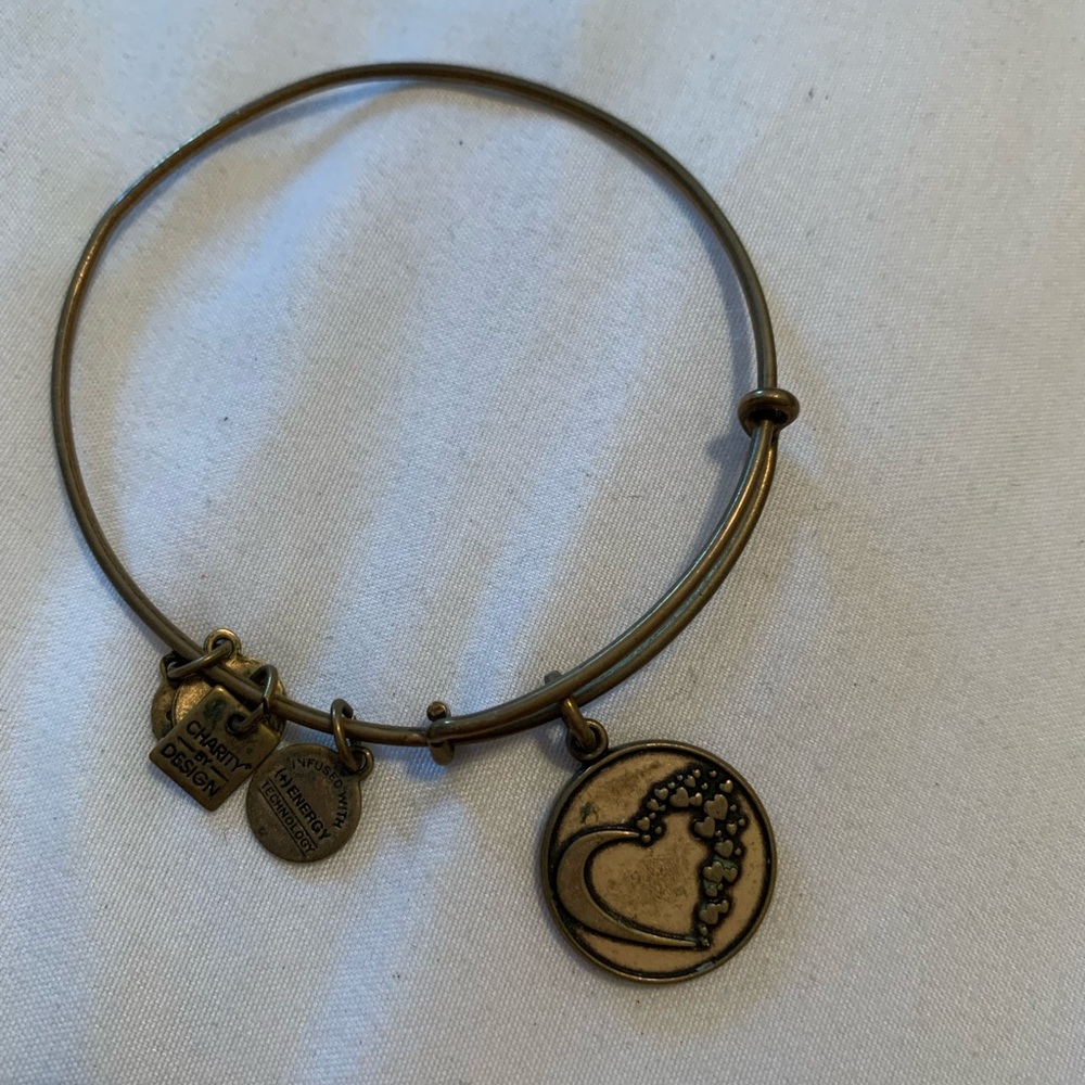 Authentic Gold Alex & Ani bangle bracelet with hearts on it